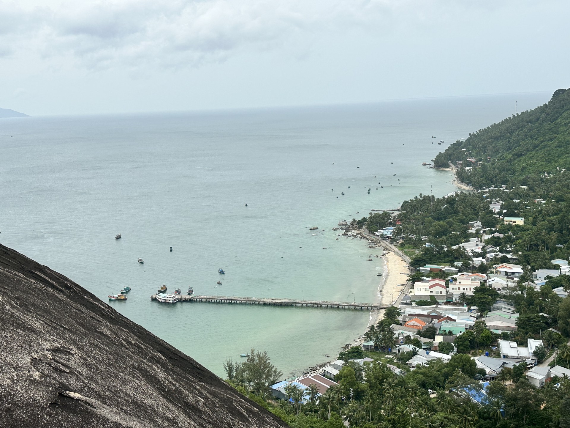 Looking down from the mountain over the main pier, the bay and the village of Lai Son